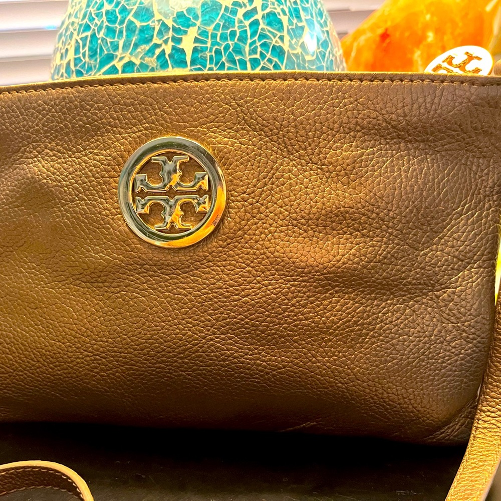 Crossbody bag. Brassy color. Great condition. Hardly used almost new.